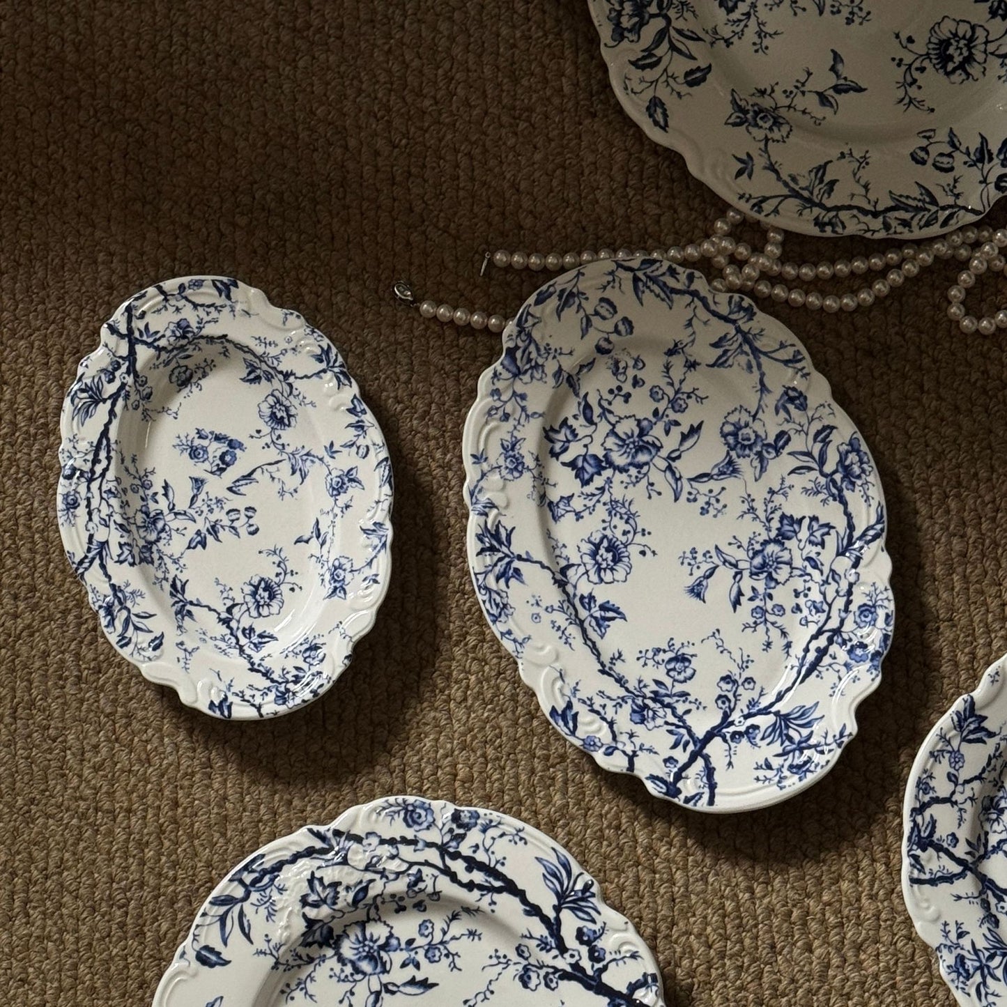 Vintage French embossed lace blue-and-white ceramic dinner plates, bowls and cups, tall plates, cups, and plates vintage series